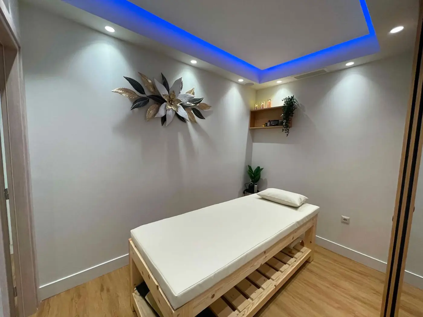 Treatment room with serene blue ambient lighting