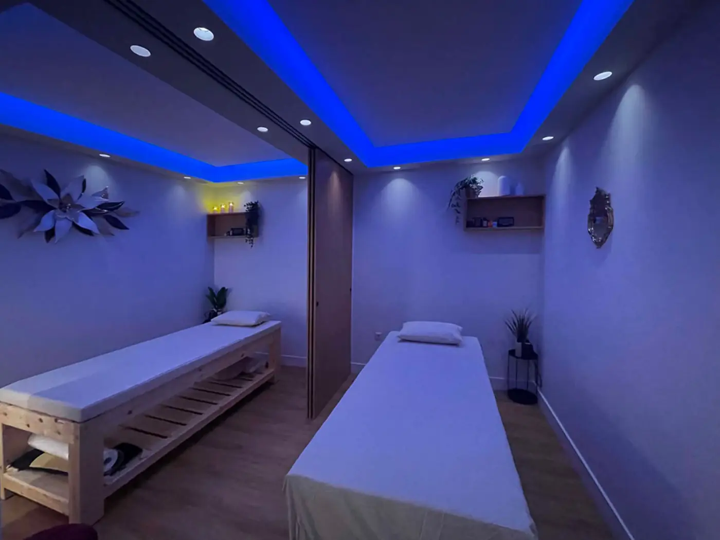 Couples treatment room bathed in blue light
